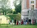procession of guests in front of the Renaissance chateau