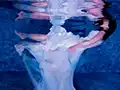 underwater photo shoot of bridal dress