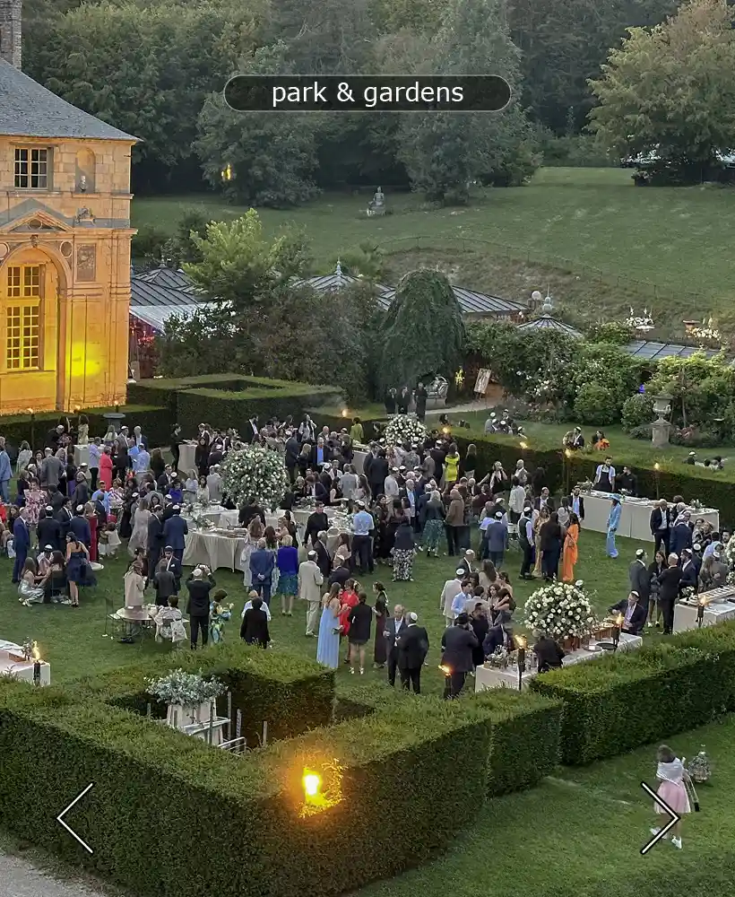a wedding in the park and gardens of the chateau