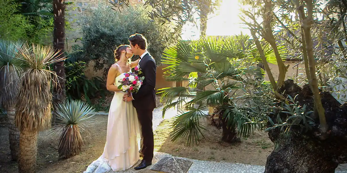 bride in the palm grove of the chateau