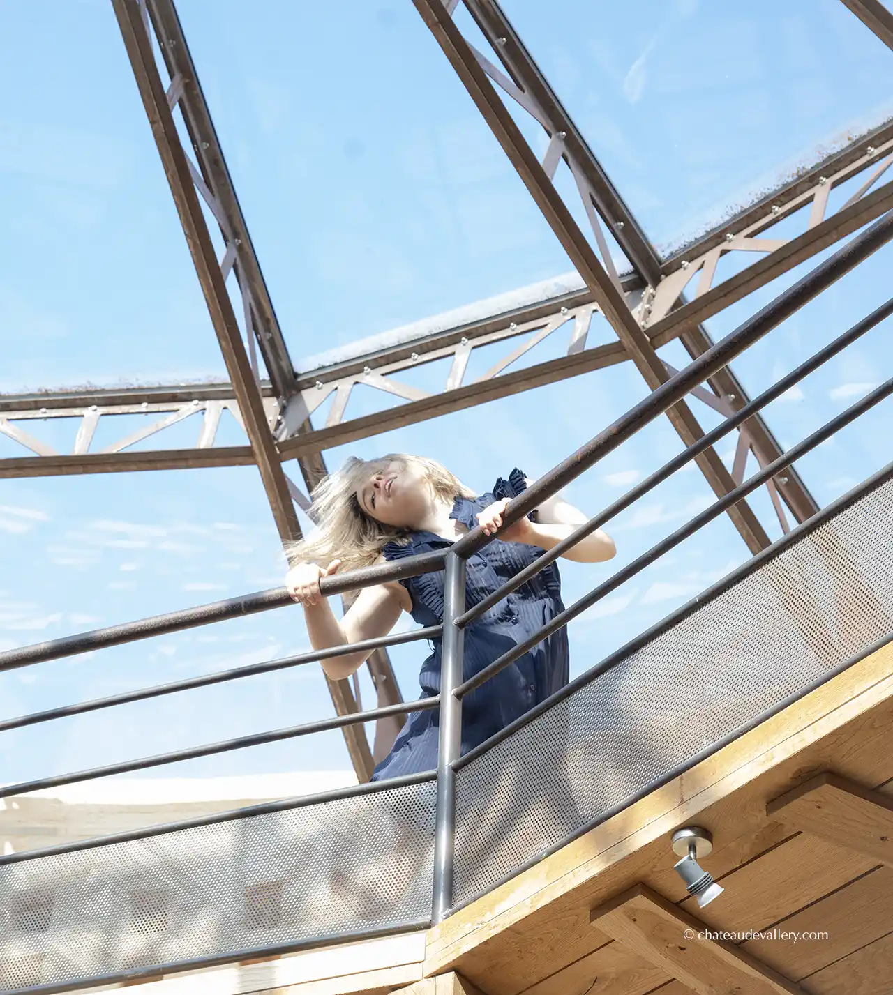 model under the Burgundy skies