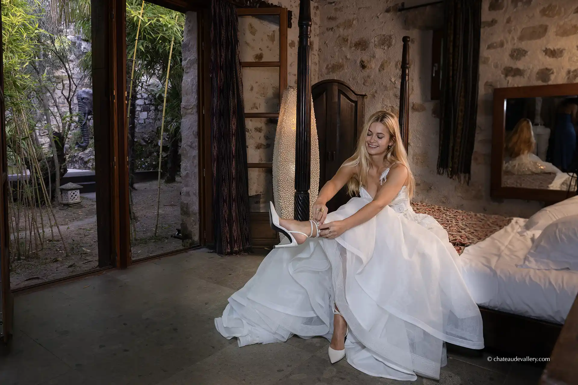model in a bridal bedroom