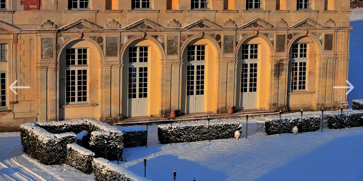 facade of the castle under the snow