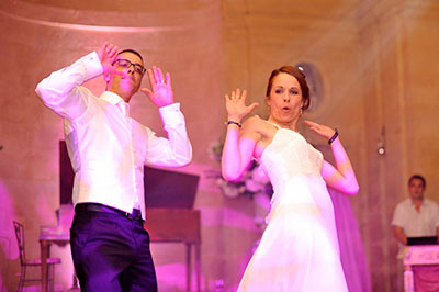 bride and groom dancing in the gallery