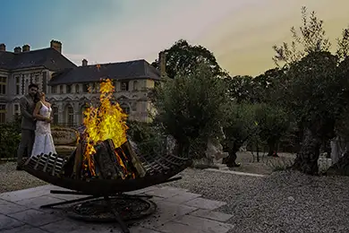 bonfire for a wedding in front of the chateau